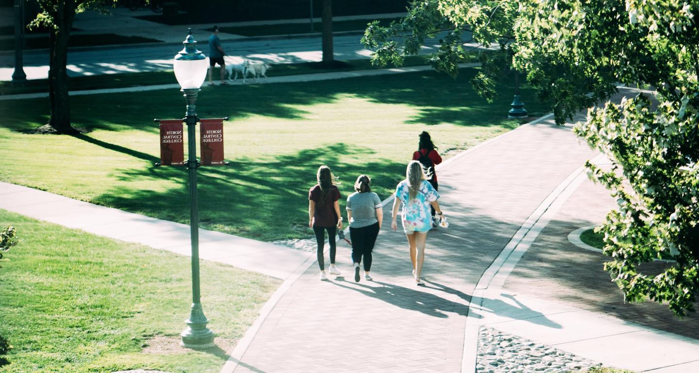 students walking on campus